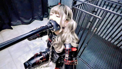 Asian bondage pet gagged in latex harness kneeling submissively