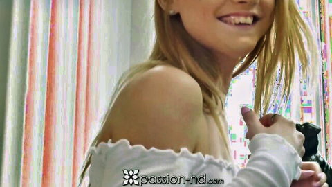 Blonde teacher smiling seductively in white off-shoulder top after piano lessons