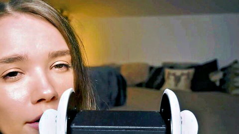 Bunny Marthy ASMR close-up, brunette model with headphones, oral tease