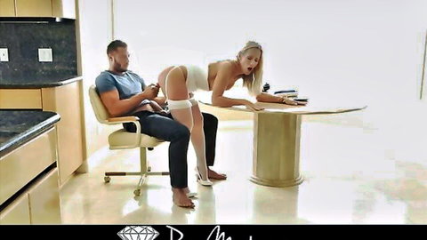 Blonde MILF in tight white corset bent over seducing man for erotic sex