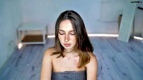 Silent Chill Chaturbate pretty doll in gray tube top, serene brunette gaze