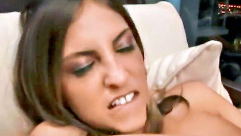 Brunette beauty moaning in ecstasy during intense group sex