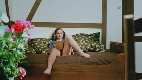 Blonde Swedish woman in hairy erotica exposing pussy while painting toenails