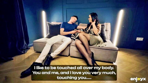 Sexy long-haired babe in shiny gold dress gets thighs touched by stud on couch foreplay tease