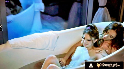 Busty brunette lesbians in bubble bath groping huge tits intimately from behind