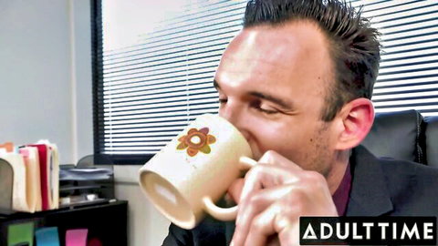 Alex Pioneer as office manager sipping coffee in suit, April Olsen anal scene teaser
