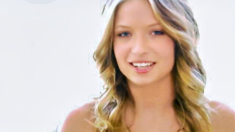 Alyssa Branch blonde bimbo smiling with cleavage in sexy top