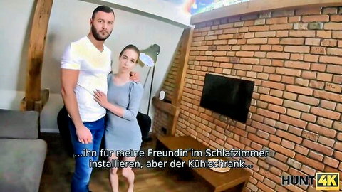 Muscular man embraces slim European woman in gray dress, Hunt4K scene