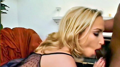Blonde in sheer black lace lingerie sucks thick BBC with hand on her head