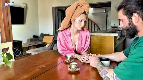 Horny Russian MILF in pink robe sharing intimate coffee moment with bearded man