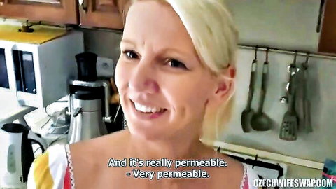 Blonde mature wife smiling in kitchen during Czech wife swap tease
