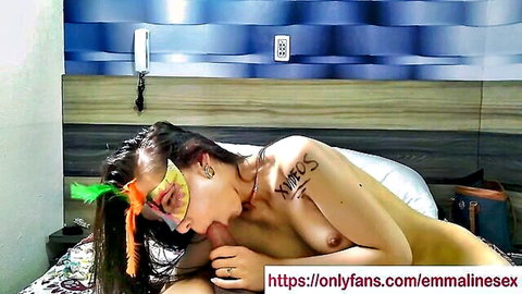 Emmaline Sex topless in feathered mask, seductive pose