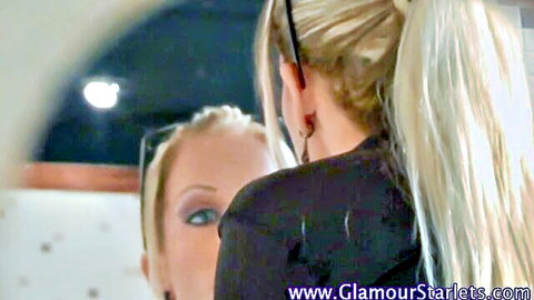 Blonde glamour slut in ponytail gazes in mirror reflection
