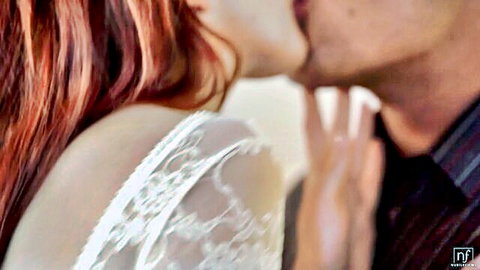 Amarna Miller in passionate kiss with man in lace top