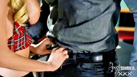 Busty blonde in plaid skirt grabs black guy's belt in steamy classroom tease