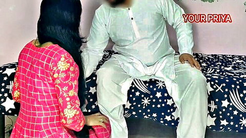 Indian wife Priya in pink saree with father-in-law on bed