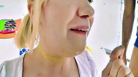 Zelda Morrison blonde in white top, teasing hand gesture close-up