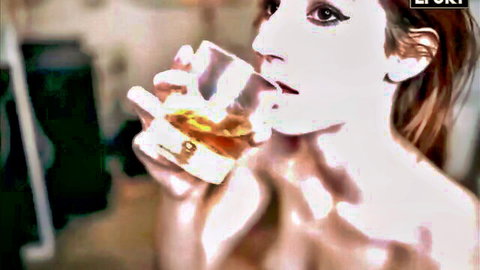 Slim redhead woman topless drinking whiskey in adult fail video