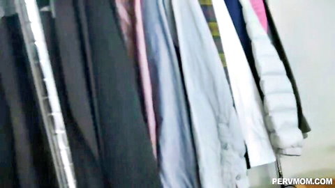 Danica Dillon busty stepmom in closet with hanging clothes, PervMom preview