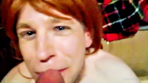 Cum-covered red-haired crossdresser sucking cock in amateur video