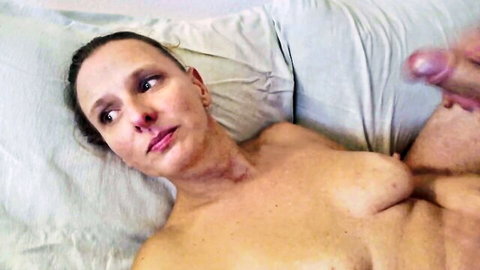 Amateur married wife teased by husband's cock during foreplay on bed