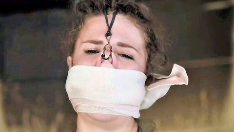 Emily Addison gagged with nipple clamps in BDSM bondage training