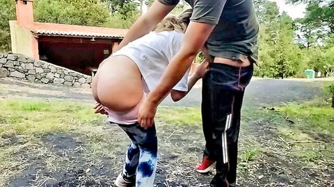 BlondieBlow bent over exposing ass in yoga pants for public outdoor fun