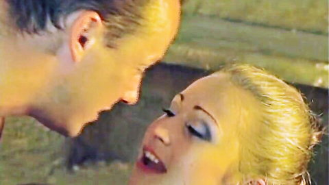 Blonde Christina in passionate close-up kiss with partner