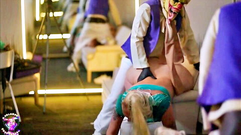 Beautiful buxom blonde MILF bent over in doggy style by costumed man