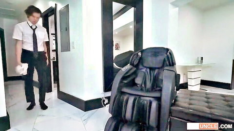 Young man in white shirt and tie enters room with massage chair