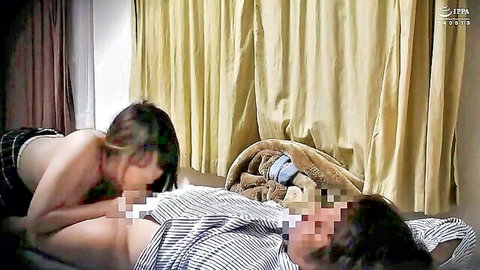 Married Asian woman topless in skirt giving censored blowjob to husband