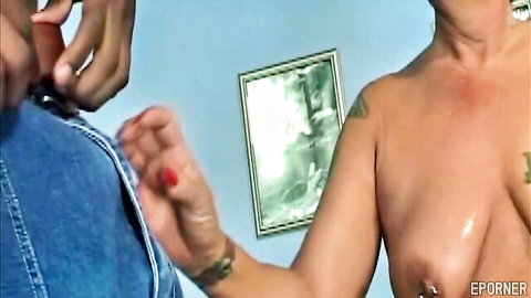 Black man's hand squeezing mature white granny's huge shiny big tits closeup