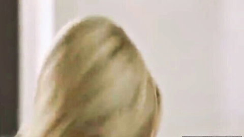 Seductive blonde babe looking back over shoulder with teasing smile ready for BBC pounding