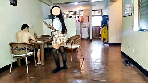 Naughty schoolgirl in plaid miniskirt stockings teases shirtless guy at kitchen table