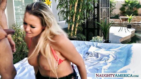 Abbey Brooks blonde babe giving handjob in red bikini outdoors