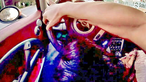 Woman driving red car in crowded streets during threesome