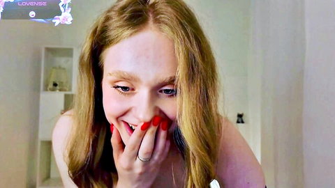 Cute blonde Flirtypixy smiling flirtatiously on cam, small tits tease