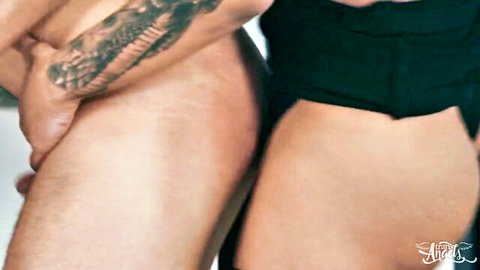 Tattooed muscular guy grabs skinny white girl's bare ass and pussy with his thick hard cock in locker room