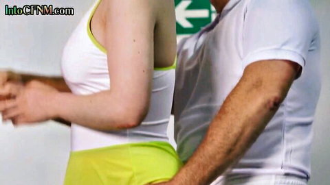 Busty blonde in tight white tank top and yellow mini skirt groped by clothed men in CFNM tease