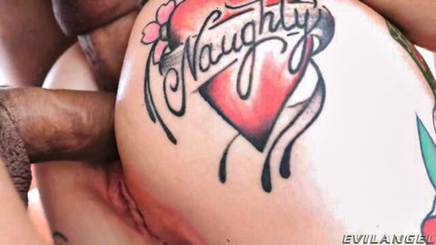 Big black cock pressed against tattooed 'Naughty' white girl's pale belly closeup