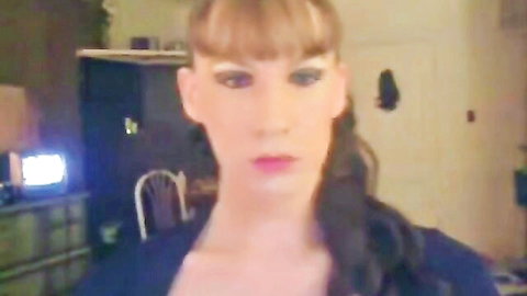 Stunning trans woman with heavy makeup and plump red lips in amateur homemade video