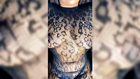 Ebony babe's massive tits visible through sheer black leopard lace top with hard nipples