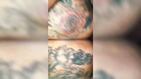 Curvy tattooed woman in stockings showing big ass