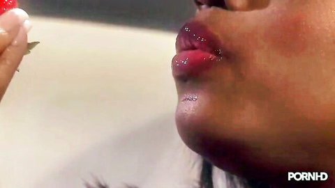 Ebony beauty with glossy red lips close-up, teasing solo masturbation