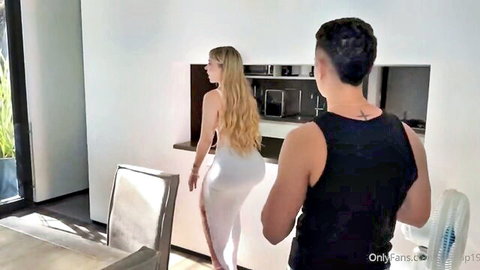 Blonde in tight white dress walking away from fit man in tank top