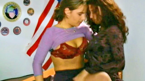 Two brunettes in lingerie embracing passionately, Uranus Experiment 1999