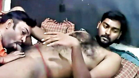 Indian threesome with hairy men, woman getting nipple sucked while handjobbing exposed cock
