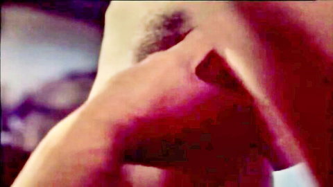 Vintage close-up of woman sucking thick bushy cock during intense blowjob