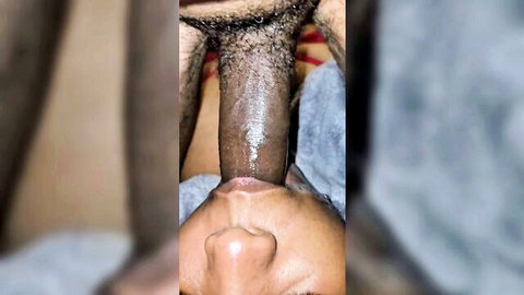 POV closeup of thick ebony cock pressed against Asian girl's wet lips during amateur blowjob