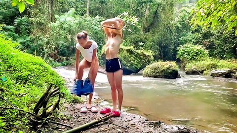 Katya Clover topless flashing pussy and ass in Bali jungle river